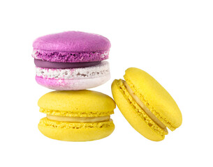 Three French macarons yellow and purple isolated on white background.