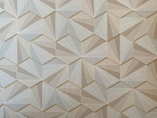 Texture abstract from many geometric shapes of yellow gold color hexagons. The background