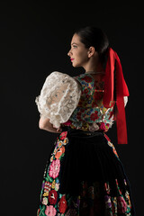 Young beautiful slovak woman in traditional dress. Slovak folklore