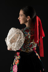 Young beautiful slovak woman in traditional dress. Slovak folklore