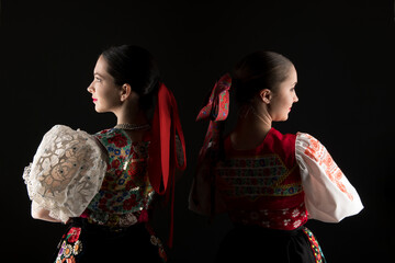 Young beautiful slovak woman in traditional dress. Slovak folklore 