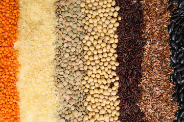 Various raw veggie seeds as background, top view
