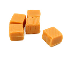 Caramel candies isolated on white background