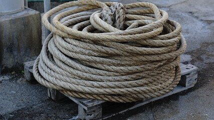 Fototapeta na wymiar fishing coiled rope as background