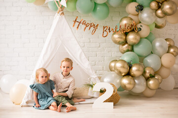 Brother with sister at boho birthday