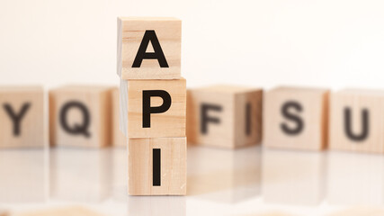 word api from wooden blocks with letters, concept