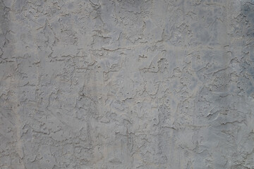Textured stucco grey wall surface background 