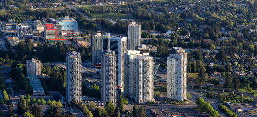 Aerial View from an Airplane of Residential Homes and Buildings near Surrey Central Mall. Greater Vancouver, British Columbia, Canada.