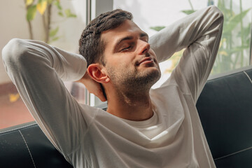 man at home relaxed on the sofa