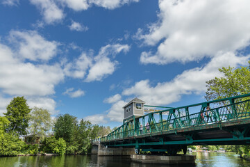 A view of the Huntsville Swing Bridge from the Town dock park on the Muskoka River.