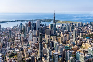 Foto op Canvas An aerial view of downtown Toronto skyline from the north looking south toward the business district and the Toronto Islands. © LorneChapmanPhoto