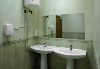Two ceramic washbasins