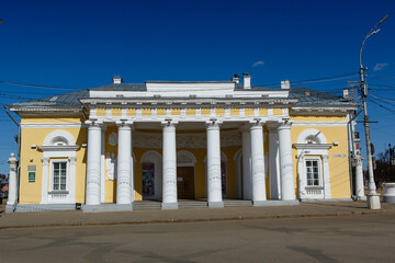 Old Guardhouse on Central Susaninskaya Square in Kostroma against cloudless blue sky.  Russian late classicism or empire style. Kostroma, Golden Ring of Russia