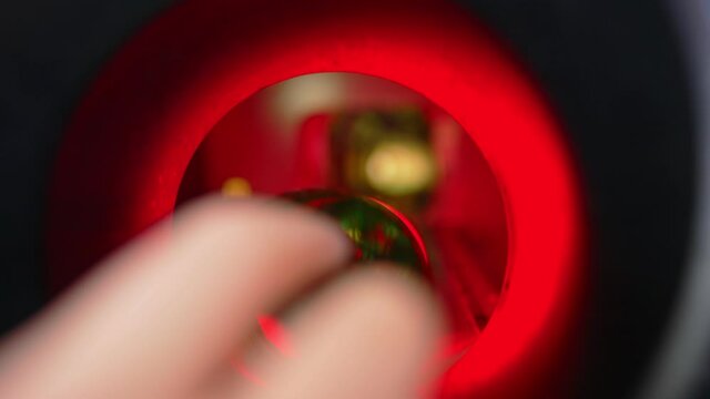 Mechanism inside of reverse vending bottle recycling machine.