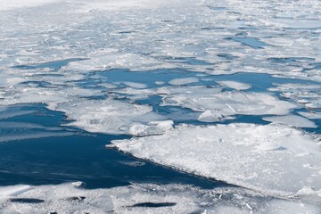 Fototapeta na wymiar Melting ice floes on Lake Storsjön in Östersund