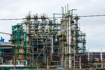 View of oil and gas refinery plant in Yaroslavl region. Petrochemical and chemical distillation process constructions and production communications.  Gasoline, petroleum, petrol production