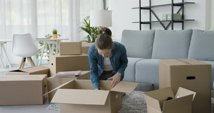 Woman moving in her new home
