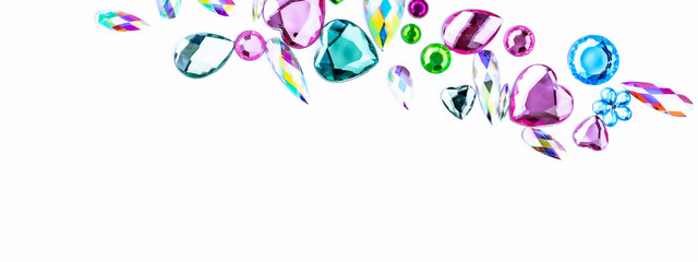White background with colorful rhinestone gems.