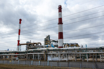 View of oil and gas refinery plant in Yaroslavl region. Petrochemical and chemical distillation process constructions and production communications.  Gasoline, petroleum, petrol production