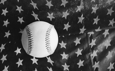 Baseball sports ball on American flag stars background in vintage style patriotic black and white.