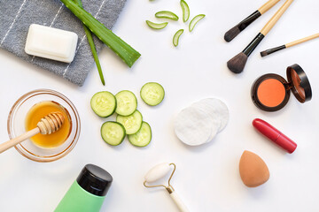 Fototapeta na wymiar Aloe vera, Cucumber, Honey, Various Make up and Beauty Products on white background.
