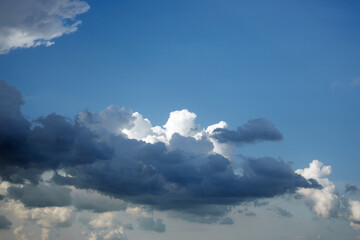 Tranquility, freedom and relaxation concept. Blue sky with white clouds and sun in sunny summer day. High quality photo
