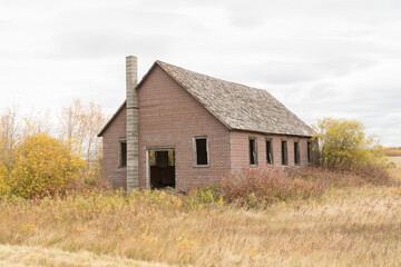 Fototapeta na wymiar old abandoned country school house