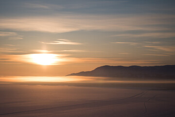 Fototapeta premium Sunrise over winter mountains