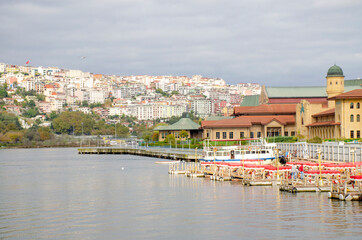 Waterfront with boats and beautiful landscape overlooking the city
