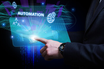 Business, Technology, Internet and network concept. Young businessman working on a virtual screen of the future and sees the inscription: Automation