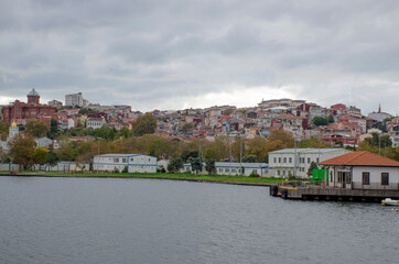 Waterfront with boats and beautiful landscape overlooking the city

