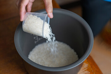Rice cup  measuring before cooking rice.