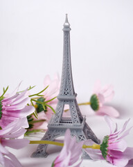 The miniature of the eiffel tower is made using a 3d printing machine. The eiffel tower is a monument located in France and has become an icon of that country. Suitable for your romantic destination.