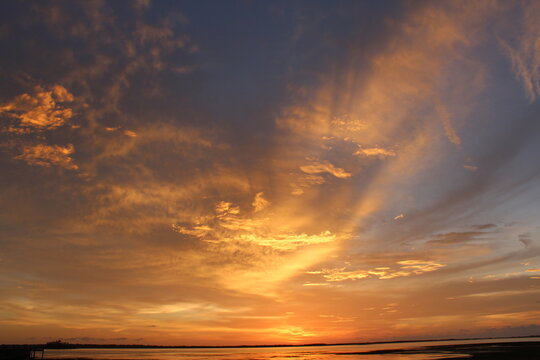 Golden yellow clouds after sunset