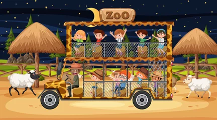 Fototapeten Zoo Safari at night time scene with children watching sheep group  © brgfx