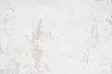 Weathered old grunge white cement concrete wall background. Rough grunge concrete texture