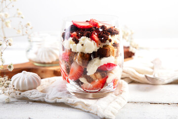 Trifles made with fresh berries and mascarpone cream. Portion desserts.