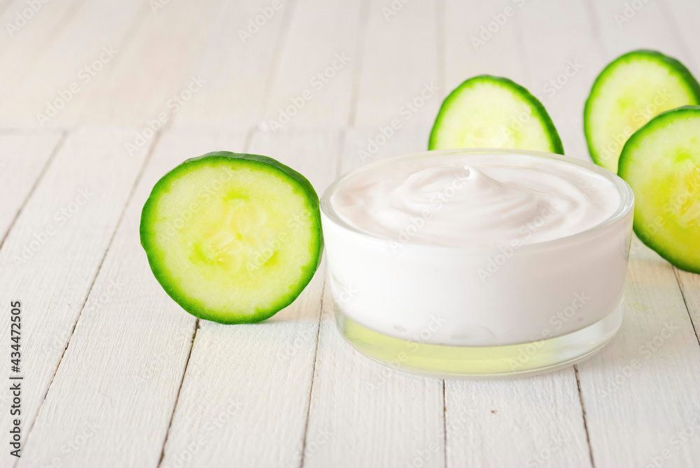 Wall mural Cucumber slices and face cream