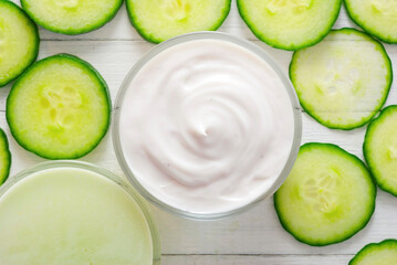 Cucumber slices and face cream