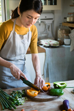 Woman Busy Cooking In The Kitchen