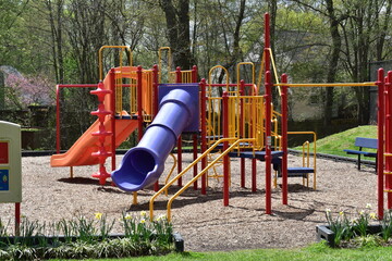 Colorful Children’s Playground Equipment in a Suburban Park
