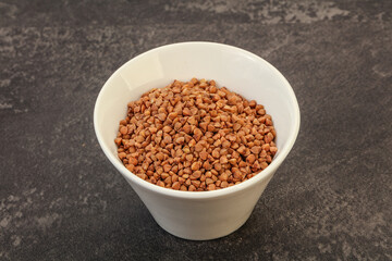 Raw buсkwheat cereal in the bowl