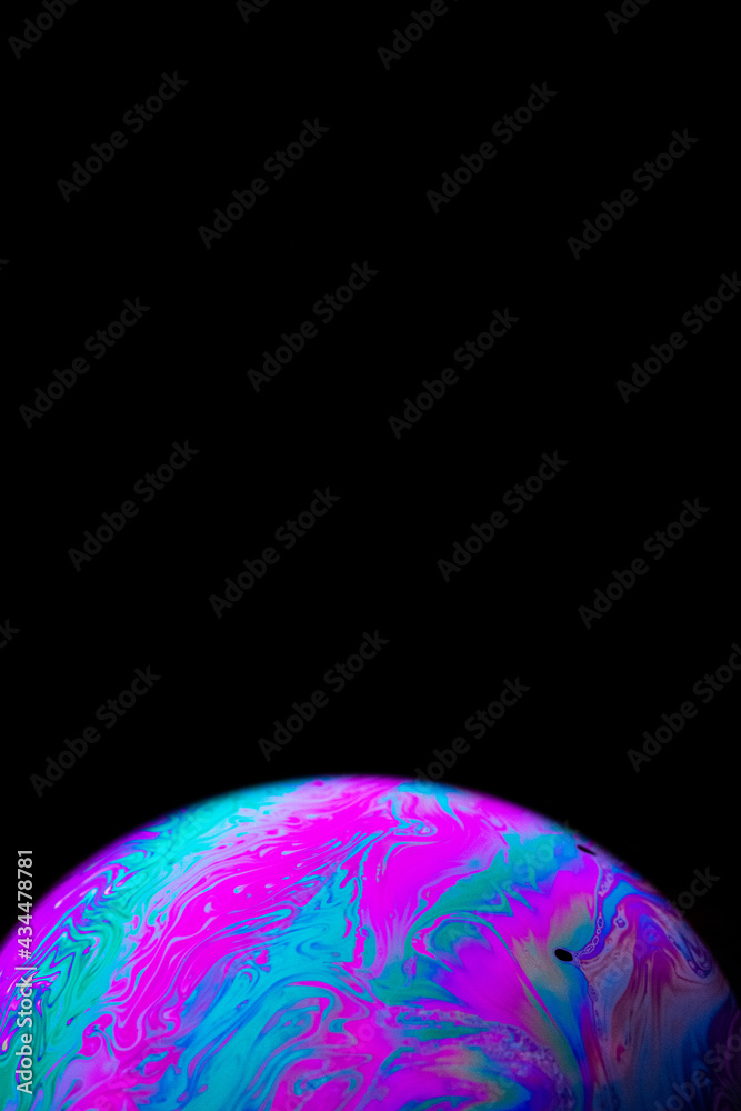 Wall mural soap bubble. abstract galaxy background with globe planet earth in universe space with sunlight on d