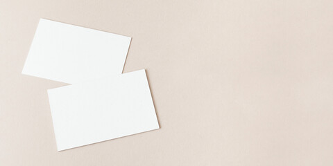 Blank business cards on beige social banner