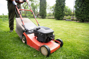 Lawn mover on green grass. Machine for cutting lawns.