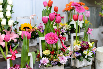 Flower arrangements for sale in a market. Beautiful colorful flowers.