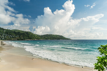 Tropical beach with ocean long waves