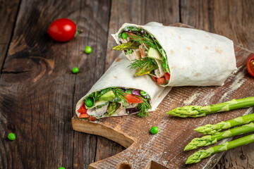 Trendy food. tortilla with chicken and vegetables. Top view. Healthy snack. fast food and junk food concept