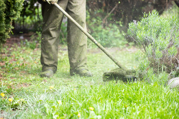 Lawn mover on green grass. Machine for cutting lawns.