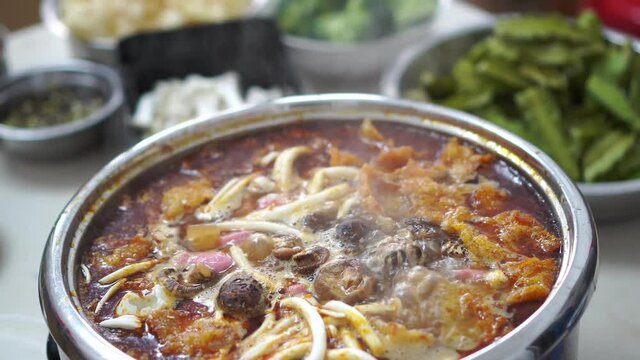 Close up hotpot with tomyam recipe is boil